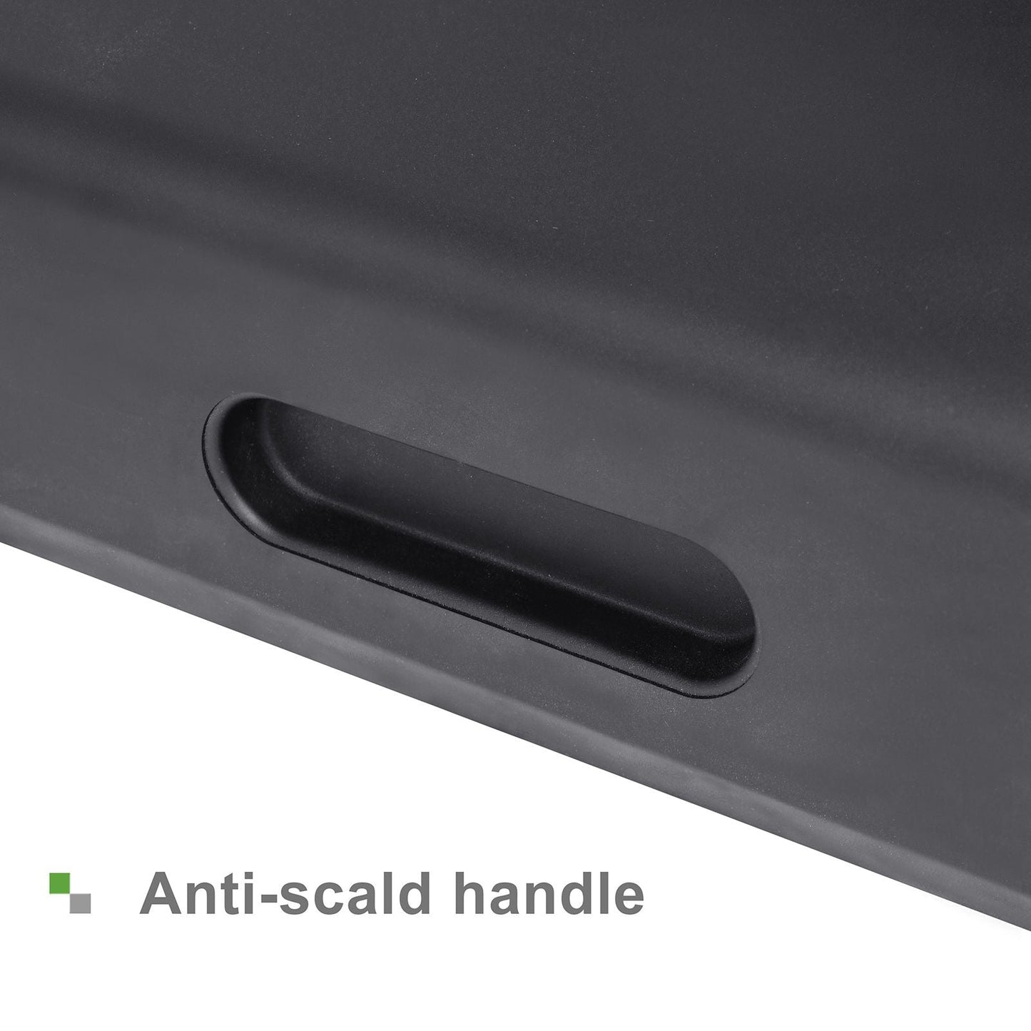 Anti-scald handle on a black surface with text label