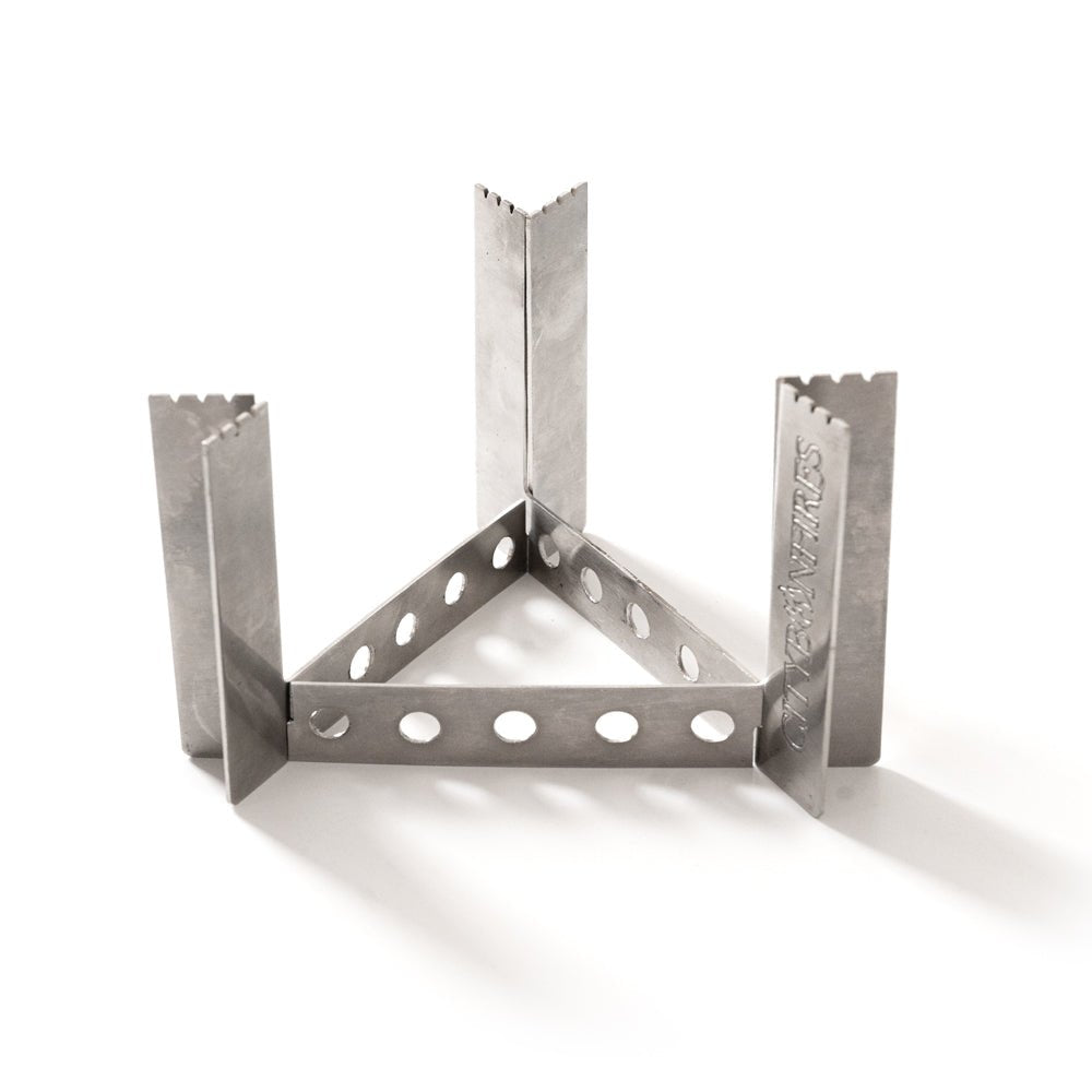 Metal camping stove on a white background