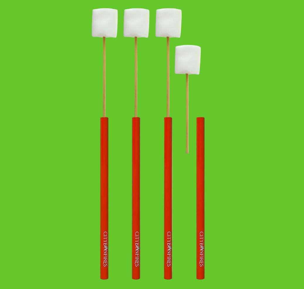 Four red marshmallow sticks with white marshmallows on a white background