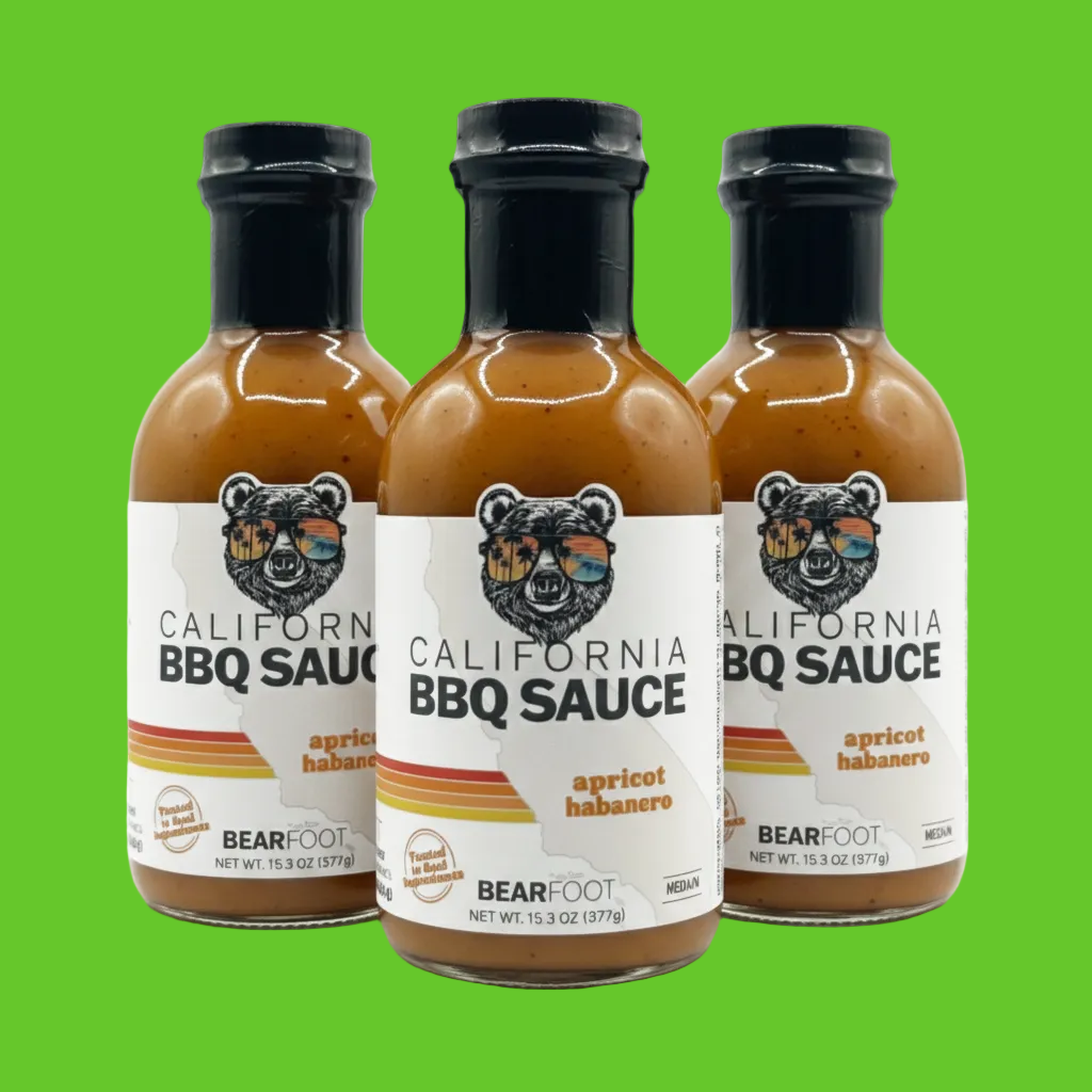 Three bottles of Bearfoot California BBQ Sauce on a white background
