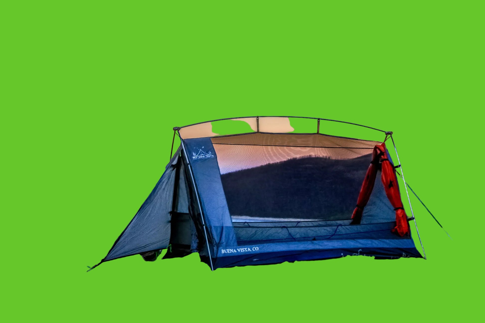 Camping tent with a scenic view of mountains and sunset.