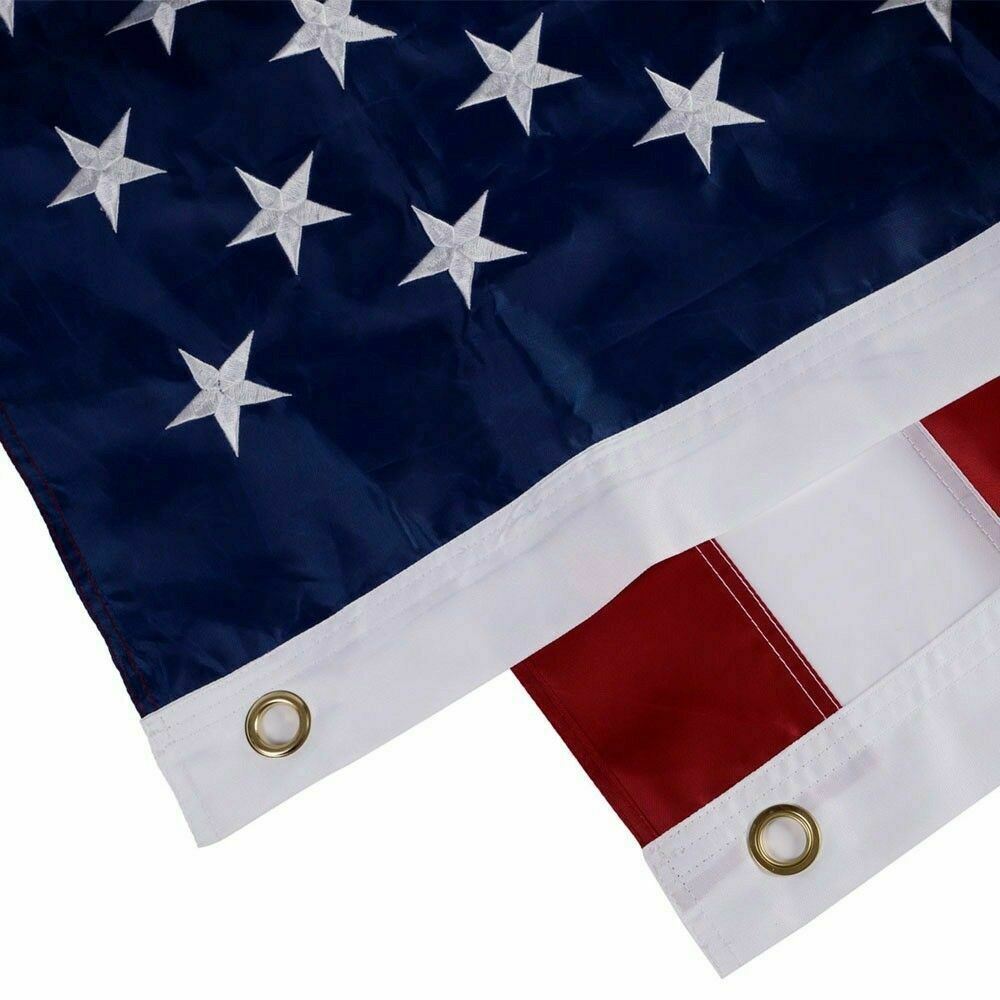 Close-up of an American flag with stars and a red square.