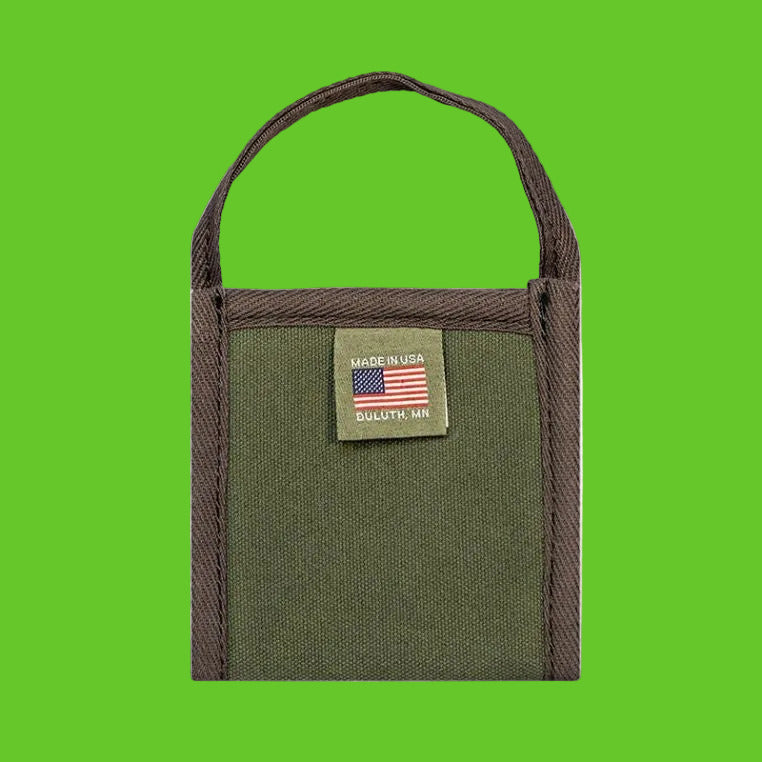 Green pouch with brown handle and American flag patch on a white background