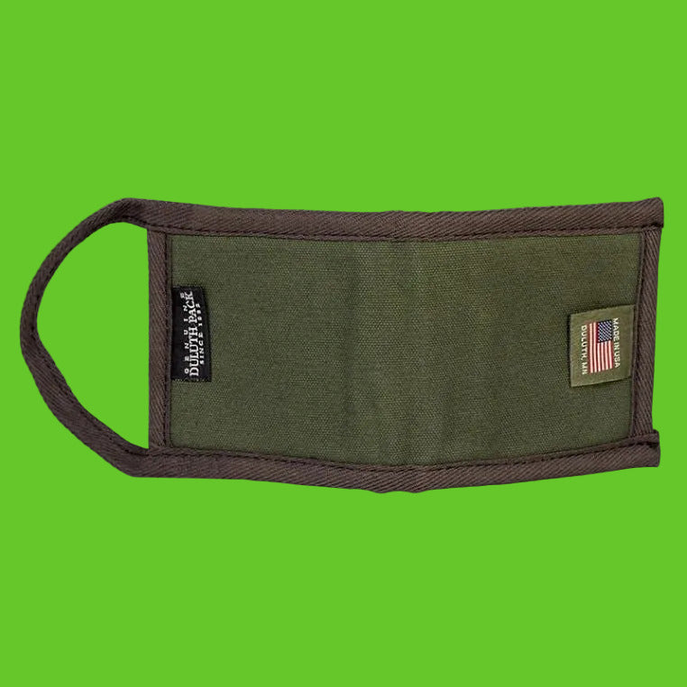 Green pouch with brown strap and labels on a white background