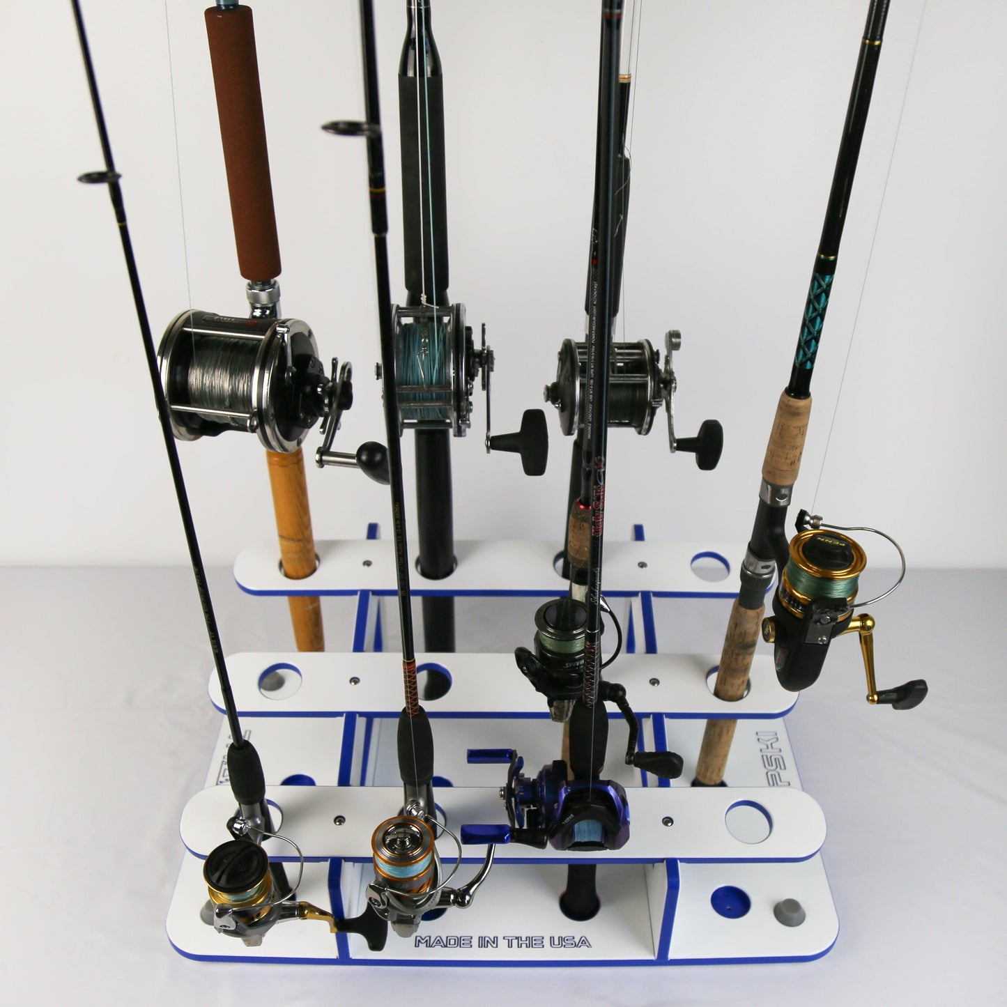 Fishing rod holder with multiple fishing rods on a white background