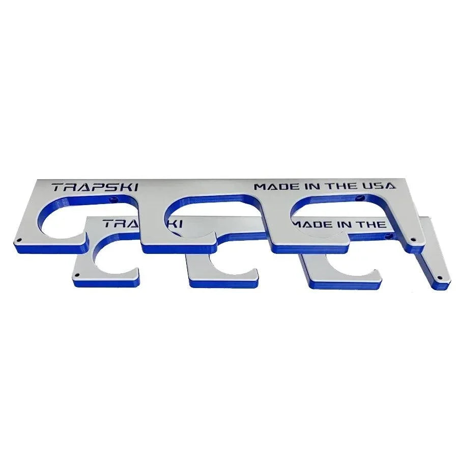 Metal ski rack with 'TRAPSKI' branding and 'Made in the USA' text on a white background