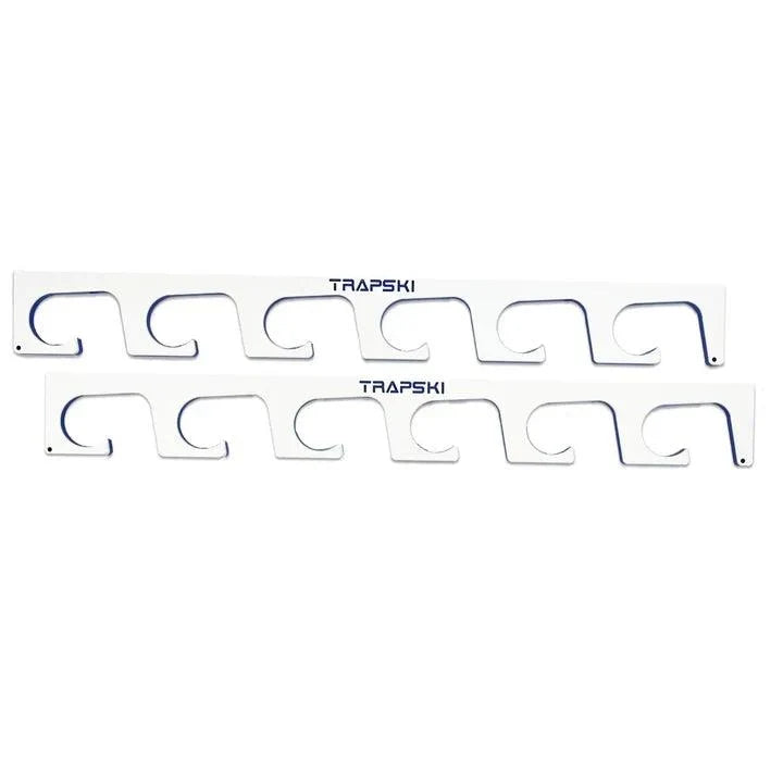 Set of metal ski binding straps with 'TRAPSKI' branding on a white background