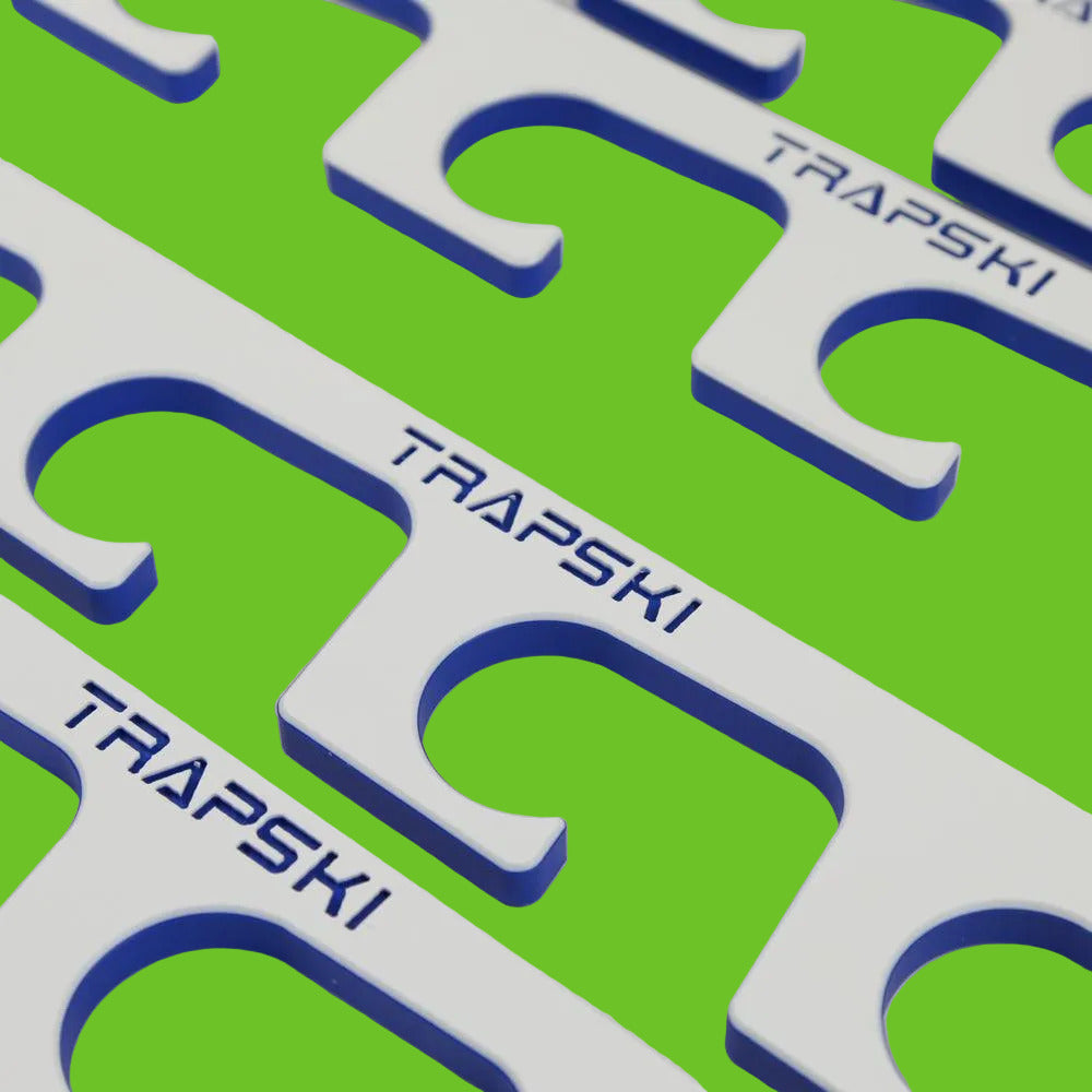 Close-up of TRAPSKI branding on a white background