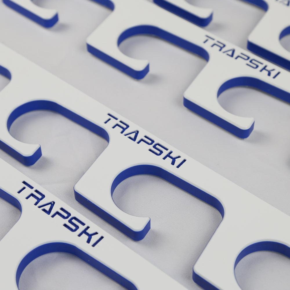 Close-up of TRAPSKI branding on a white background