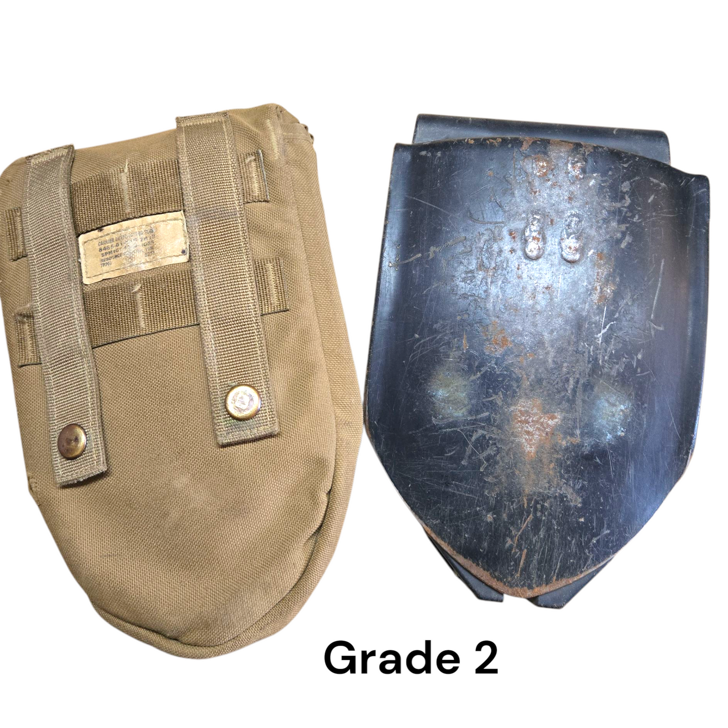 Tan military pouch with straps and a blue metal object on a white background, labeled 'Grade 2'.