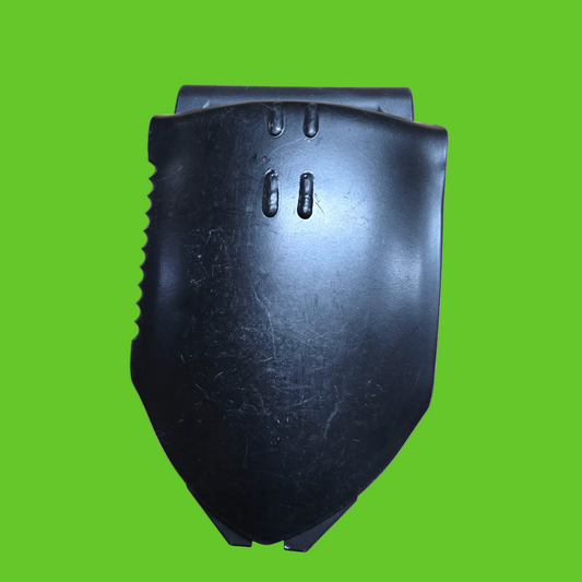 Black plastic component on a white background
